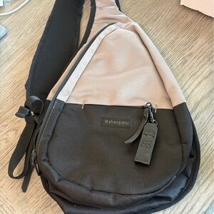 Sherpani Black and Tan Women’s  Sling Bag